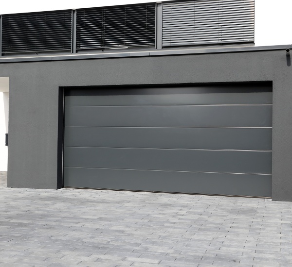 Annual garage door inspection including spring and hardware checks at a Northridge family home