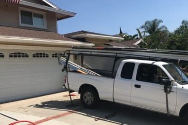 Automatic garage door opening with a smart opener installed in Los Angeles