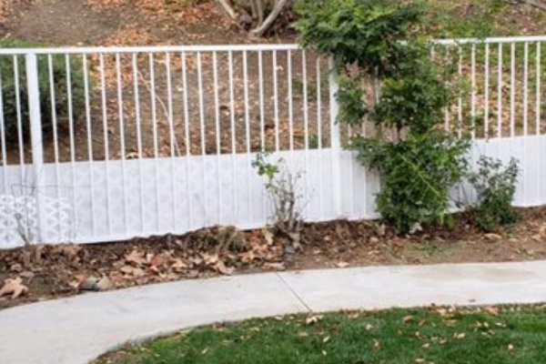 Sliding gate track and roller repair on a Los Angeles hillside driveway