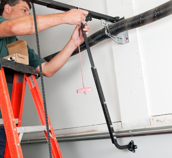 Close-up of a torsion spring assembly on a Los Angeles garage door