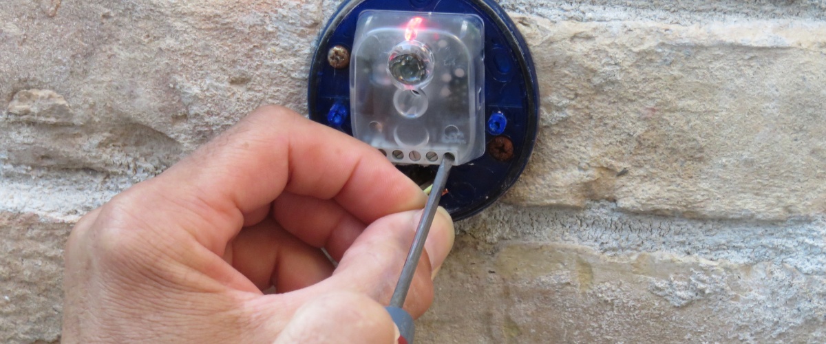 Expert troubleshooting a gate remote control in Los Angeles.